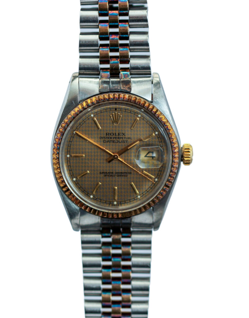 Vintage Rolex Datejust 16013 with Striking Dark Patina and Collectible Houndstooth Dial