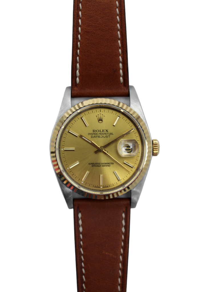 Elegant Rolex 16014 watch with a champagne dial, featuring classic design and precise automatic movement