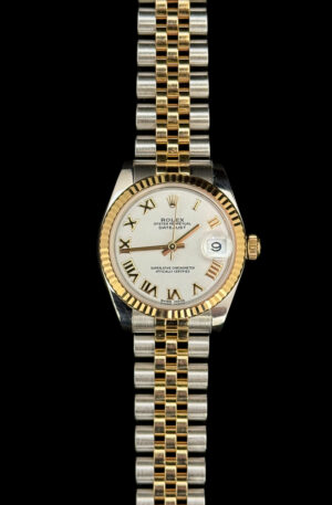 Elegant Rolex Datejust 31 model 178273 featuring a pristine white Roman dial, a harmonious blend of style and sophistication. The Jubilee bracelet adds a touch of luxury to this timeless timepiece. Perfect for any occasion. #Rolex #Datejust31 #LuxuryWatches