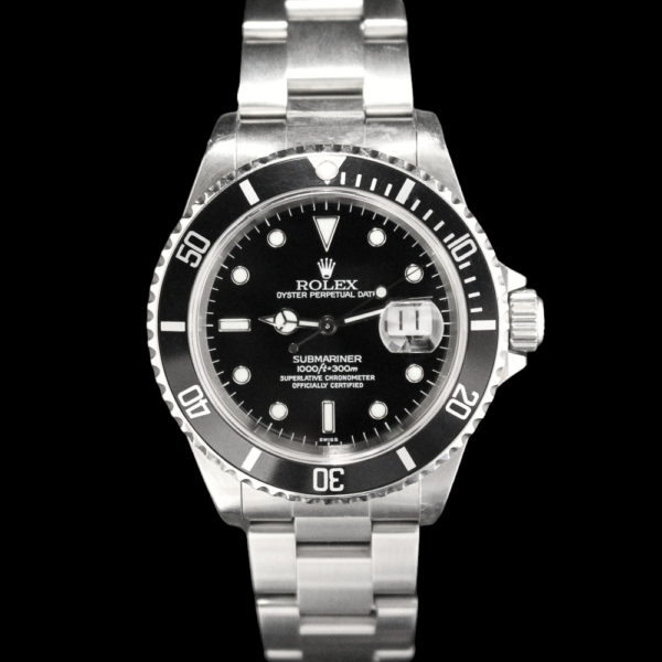 1999 Rolex Submariner 16610 with a black dial and black aluminum divers bezel