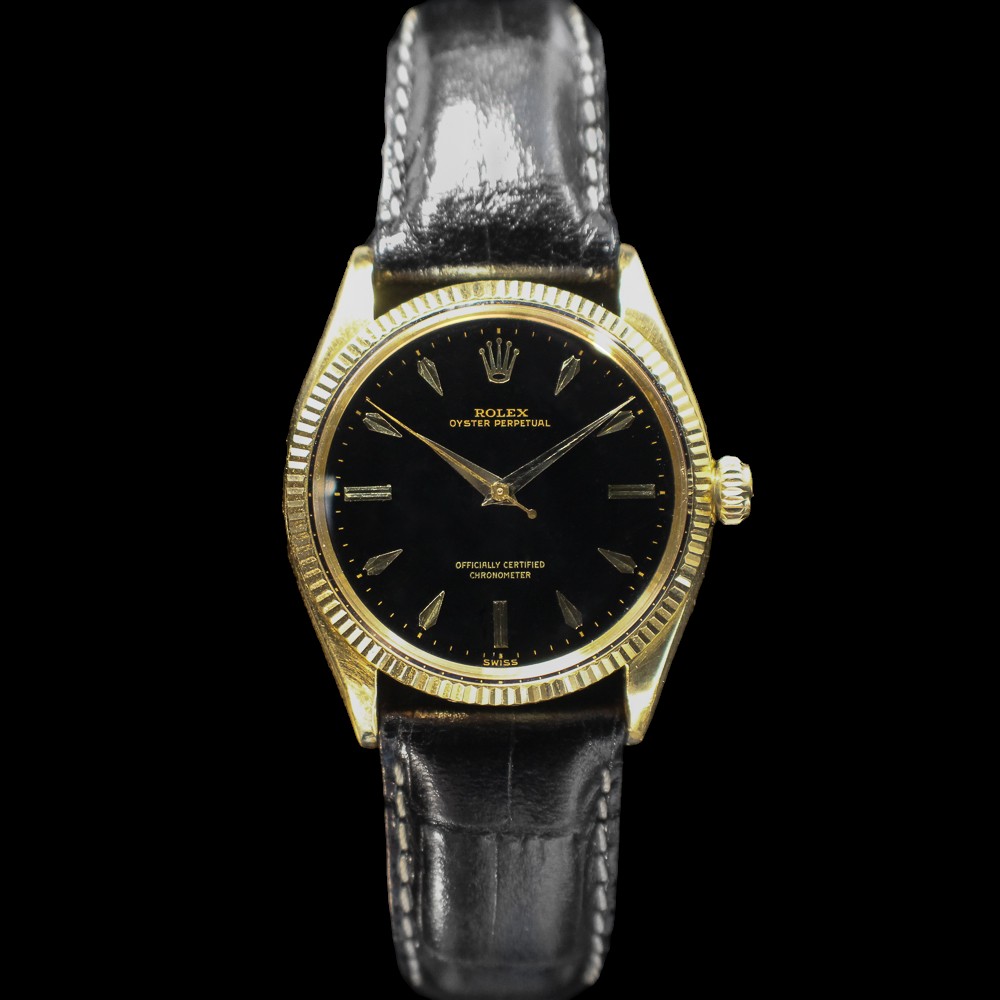 1956 Rolex Oyster Perpetual 34mm in 18k gold on a black leather strap