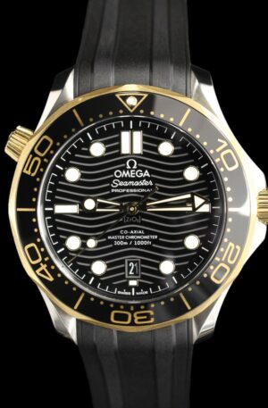 2023 Omega Seamaster Diver in gold and steel with a black dial complete set in MN
