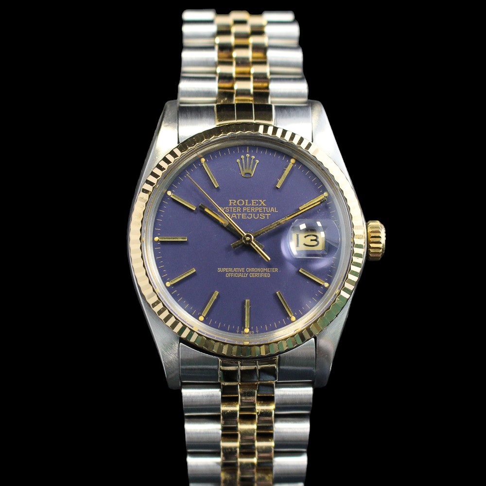1984 gold and steel Rolex Datejust 36mm with a blue dial that aged into a purple dial on a two tone jubilee bracelet