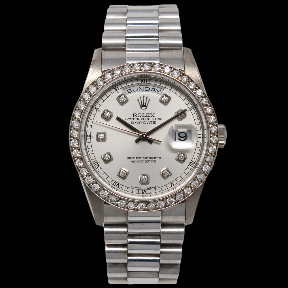 1999 Rolex Day-Date 36 white gold with a silver custom diamond dial and custom diamond bezel