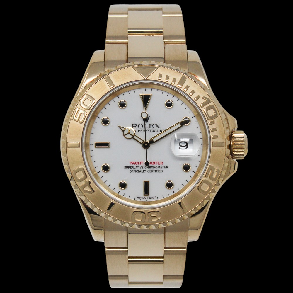 2003 Rolex Yacht-Master in 18k yellow gold with a white and onyx dial complete set